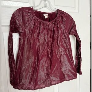 Girls metallic button up shirt.